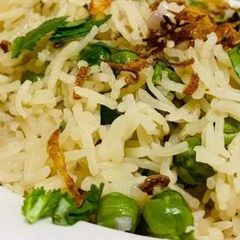 Peas and brown onion pulao A picture of Peas and brown onion pulao.