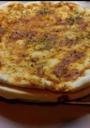 Una foto de Masa casera de pizza
