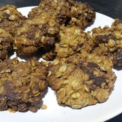 A picture of Sticky chocolate chip and ginger cookies.