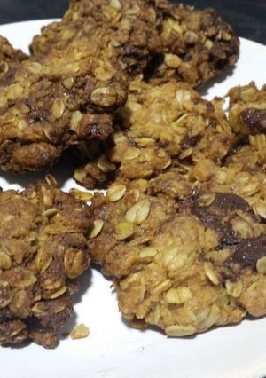 A picture of Sticky chocolate chip and ginger cookies.