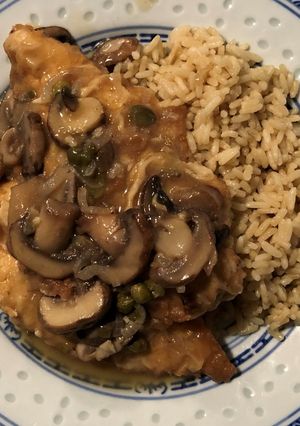 A picture of Chicken Francese with Mushrooms and Capers.