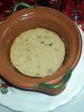Tamal de cazuela prehispánico de hongos, cebolla, epazote,  cacahuate con masa blanca. Comida vegana