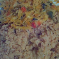 A picture of Pilau served with cabbage.