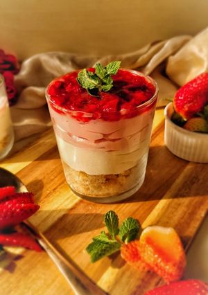 A picture of 3 layered Strawberry Cheesecake.