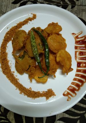 A picture of Potato and carom leaves fritters.