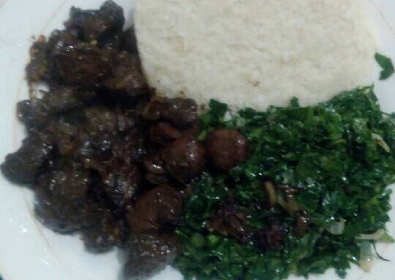 Fried beef kidney,liver,skumawiki and ugali