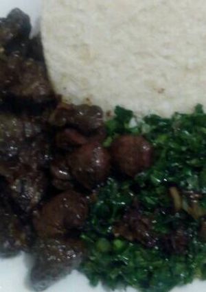 A picture of Fried beef kidney,liver,skumawiki and ugali.