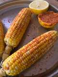 Rait wala bhutta (sand roasted corn)