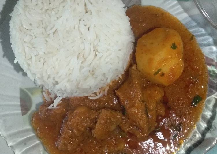 Coconut rice with mutton curry