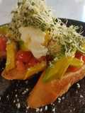 Avomato Bruschetta With Poached Egg And Alfalfa