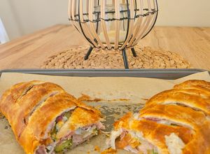 Foto di Rotolo di pasta sfoglia con prosciutto, formaggio e zucchine
