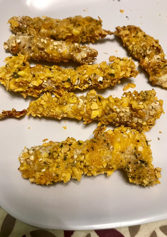 Una foto de Tiras de pollo con copos de maíz y avena