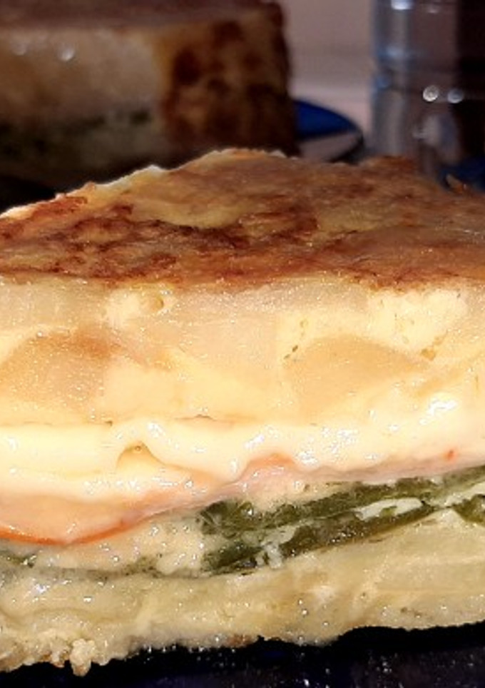 Una foto de Tortilla de patatas rellena
