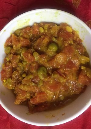 A picture of Carrots ki sabji with peas.