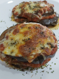 Una foto de Berenjenas a la parmesana