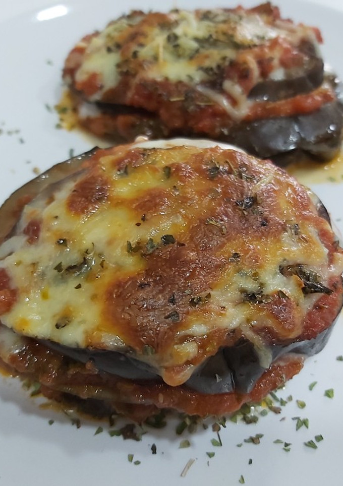Una foto de Berenjenas a la parmesana