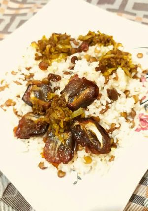 عکسی از دستور عدس پلو با کشمش و خرما دختر پز🤗👌😋