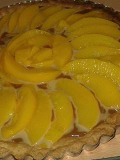 Una foto de Tarta de durazno con dulce de leche!!
