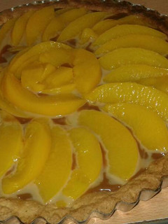 Una foto de Tarta de durazno con dulce de leche!!