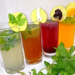 A picture of Kulukki sharbath(shaken lemonade) four flavours.