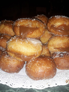 Una foto de Bolas de fraile con dulce de leche (receta fácil)