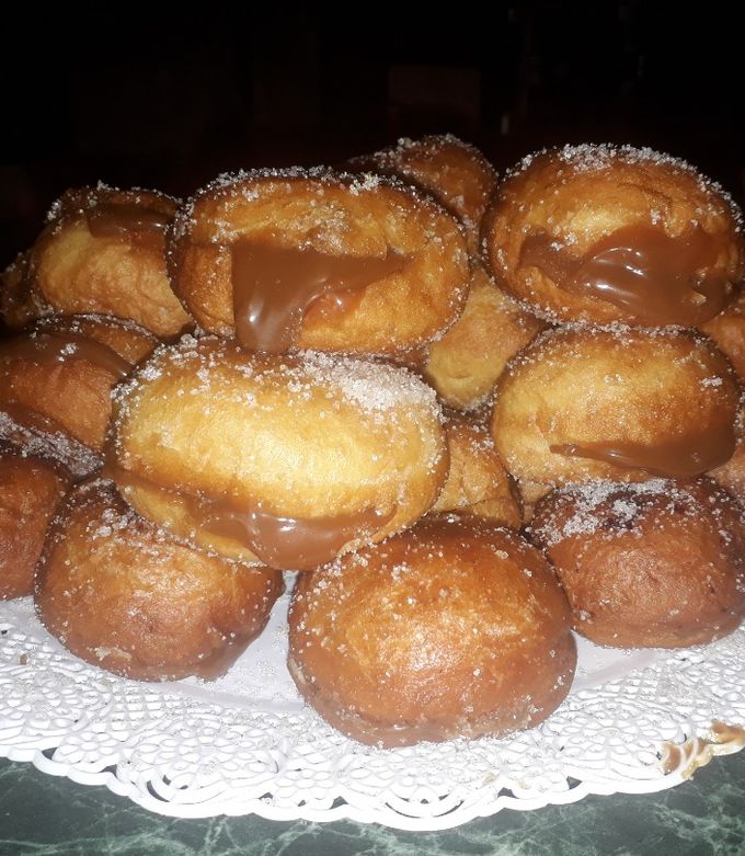 Una foto de Bolas de fraile con dulce de leche (receta fácil)