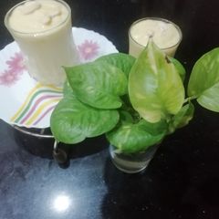 Mango Lassi with almonds A picture of Mango Lassi with almonds.