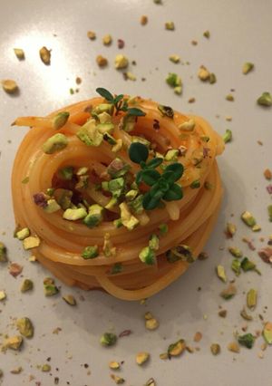 Foto di Spaghetti con salsina di peperone rosso e pistacchi