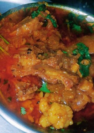A picture of Papaya mutton curry with Bengali style.
