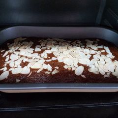 A picture of Chocolate Banana Cake with Almond slice.