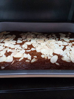 A picture of Chocolate Banana Cake with Almond slice.