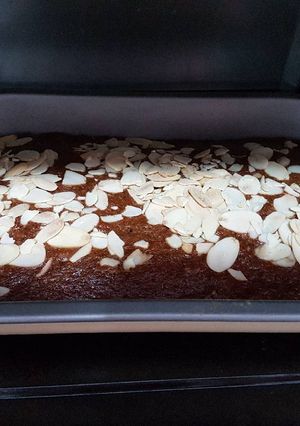 A picture of Chocolate Banana Cake with Almond slice.
