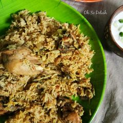 A picture of Thalapakkati chicken biriyani.