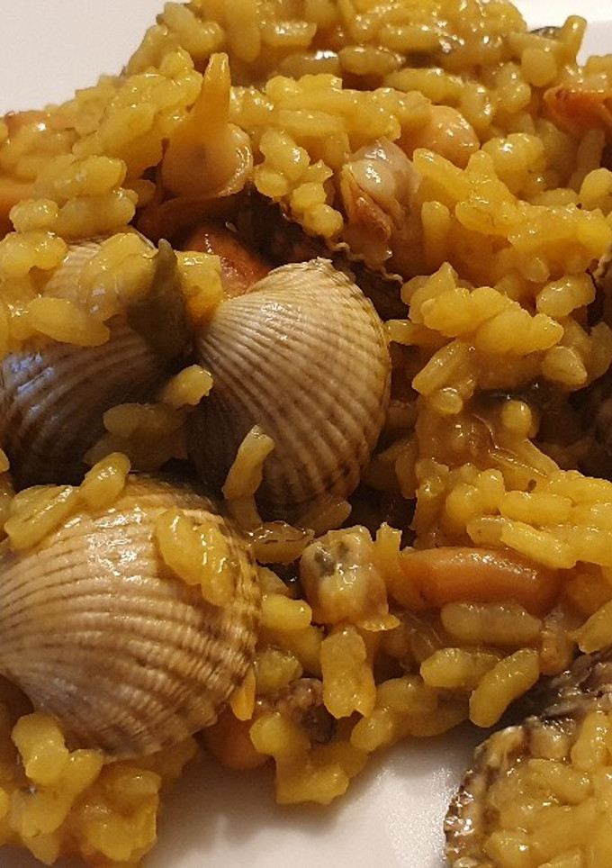 Una foto de Arroz con Berberechos y Sepia