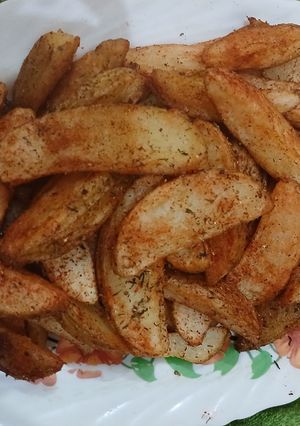A picture of Seasoned Crispy Potato Wedges.