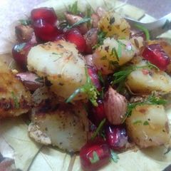 A picture of Roasted sweet potato with dil leaves.