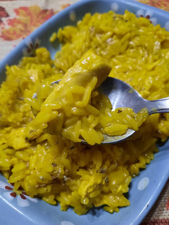 Una foto de Arroz con pollo al curry