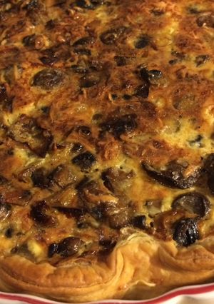 Une photo de Quiche champignons oignons