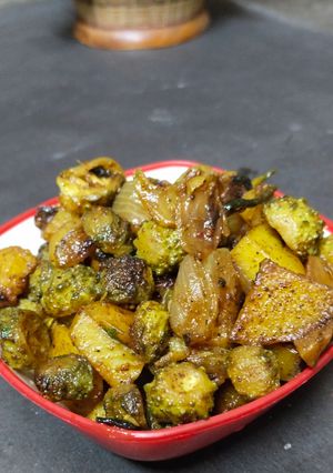 A picture of Mini karela potatoes GM masala baaji.