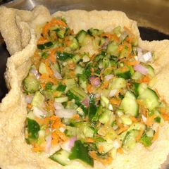 A picture of Papad cucumber salad.