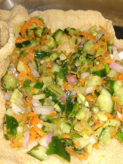 A picture of Papad cucumber salad.