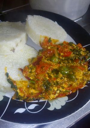 A picture of Boiled garden leaves egg sauce.