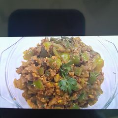 A picture of Capsicum and Green Tomato Subji.