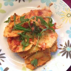 A picture of Arrabita Sauce Beef Mushroom Raviolli .