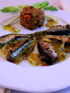 Una foto de Sardinas al horno con vino blanco y pan rallado
