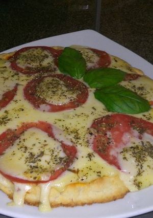 Una foto de Pizza sin tacc, a la Margarita