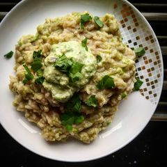 A picture of Risotto with pea puree.