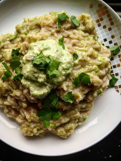 A picture of Risotto with pea puree.