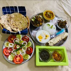 A picture of Barbatti Aloo,Mango Raita & Fried Parwal(pointed gourd).