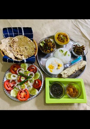 A picture of Barbatti Aloo,Mango Raita & Fried Parwal(pointed gourd).